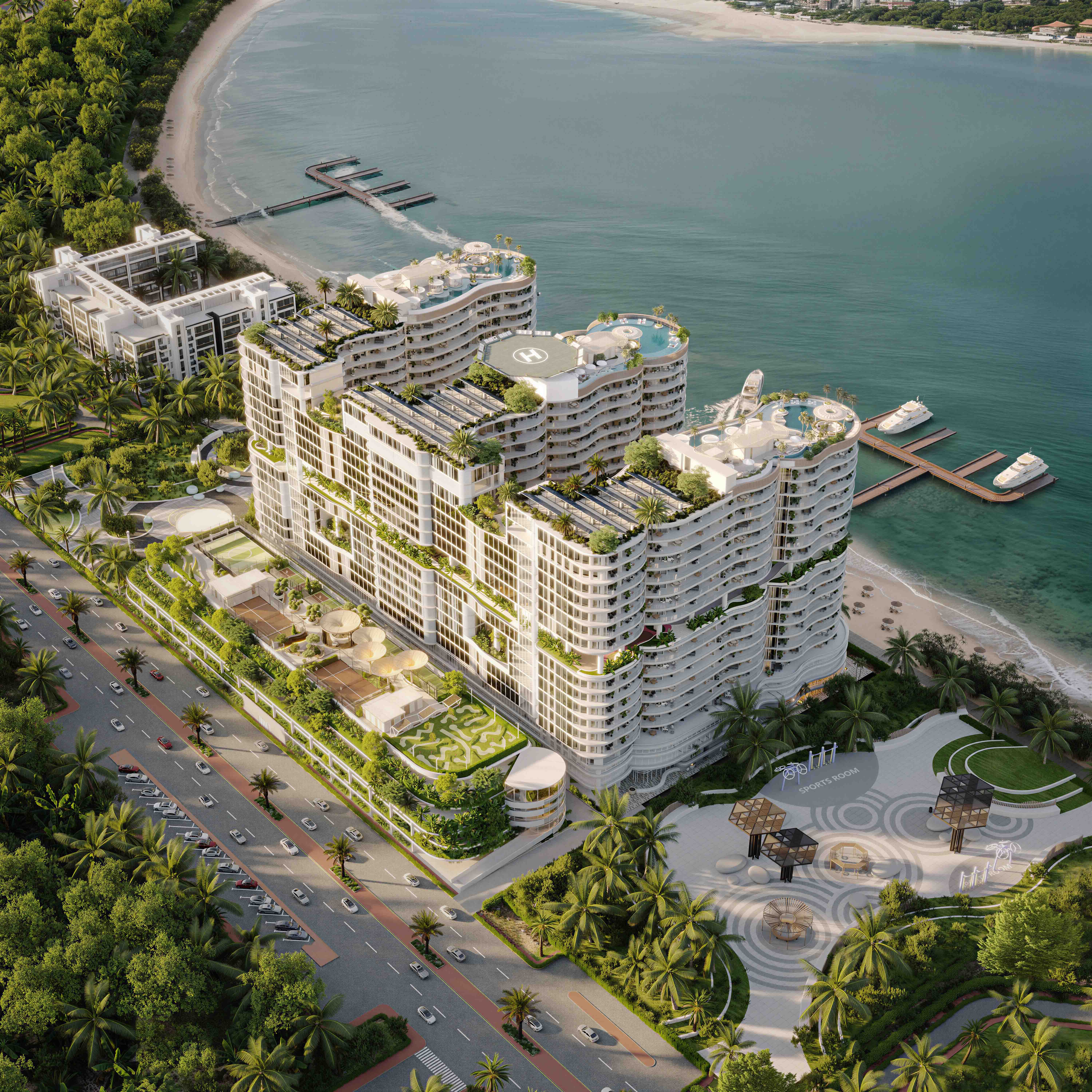 High-angle view of AMRA rising above the coastline, with infinity rooftops and a long sandy beach.
