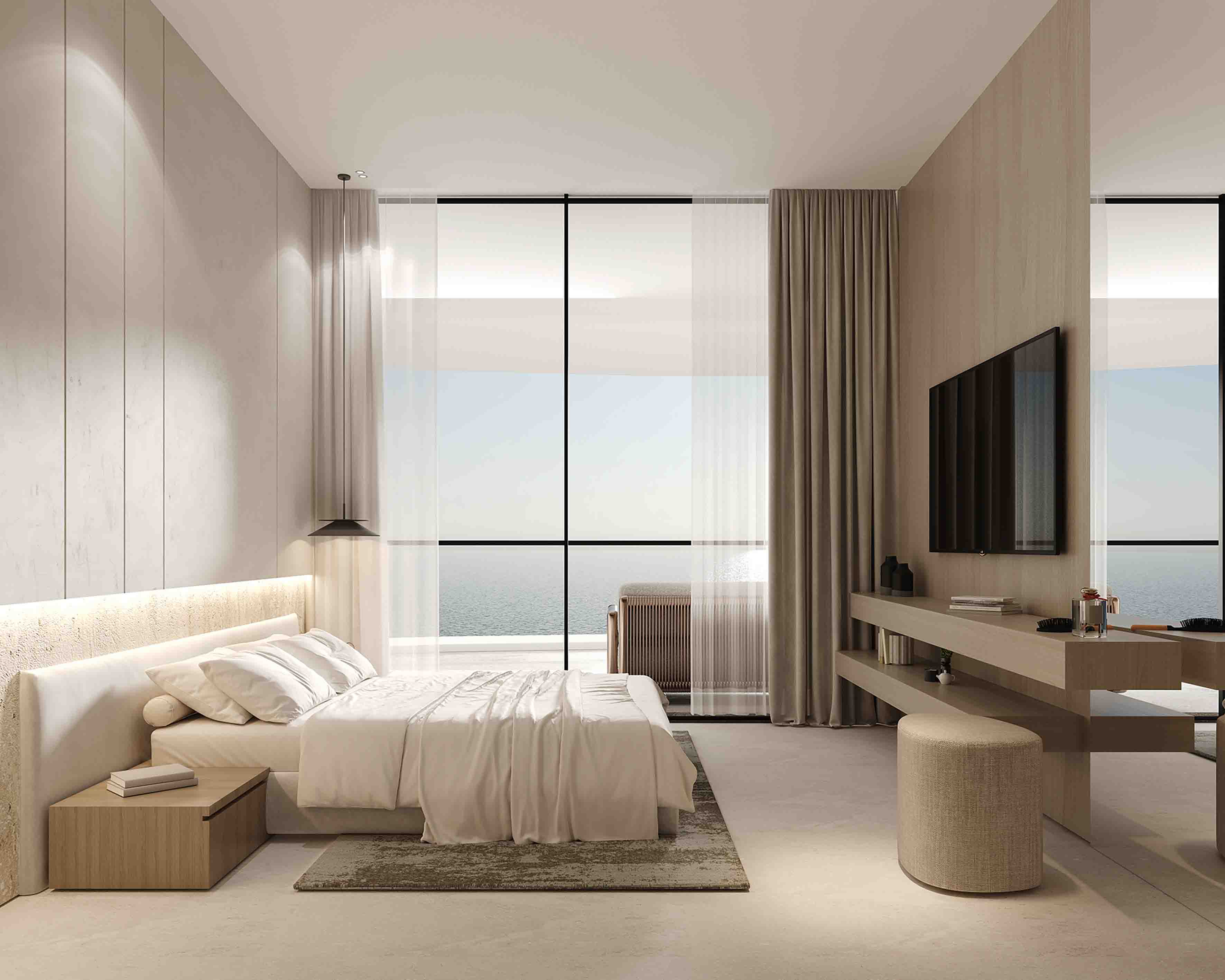 Bright master bedroom with upholstered bed, expansive glazing and ocean horizon beyond.