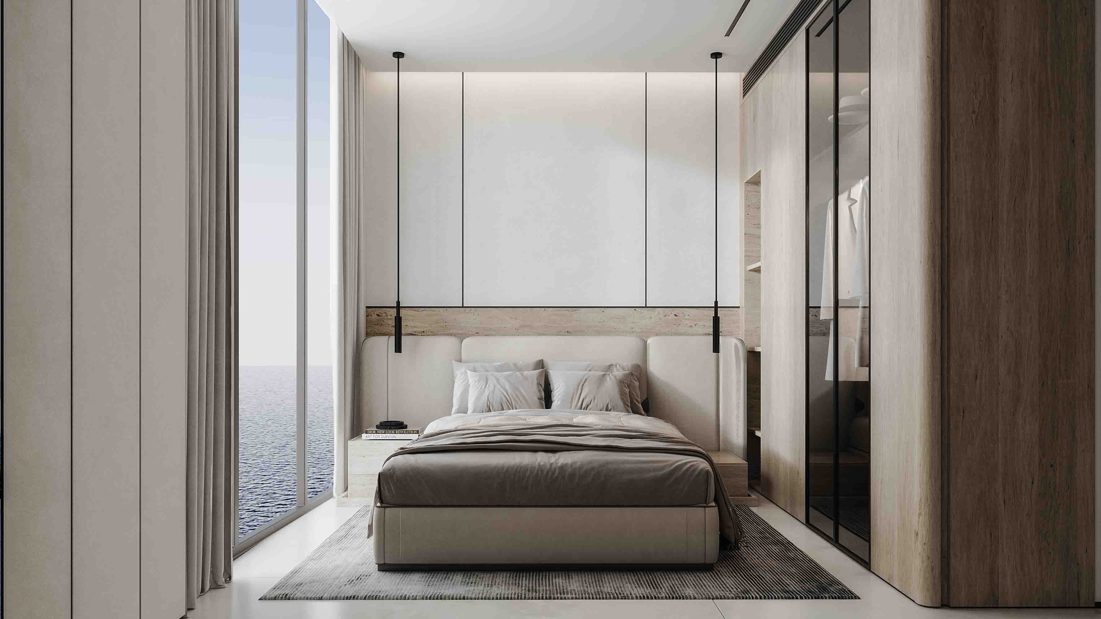 Contemporary bedroom with minimalist headboard, pendant lighting and panoramic sea view.