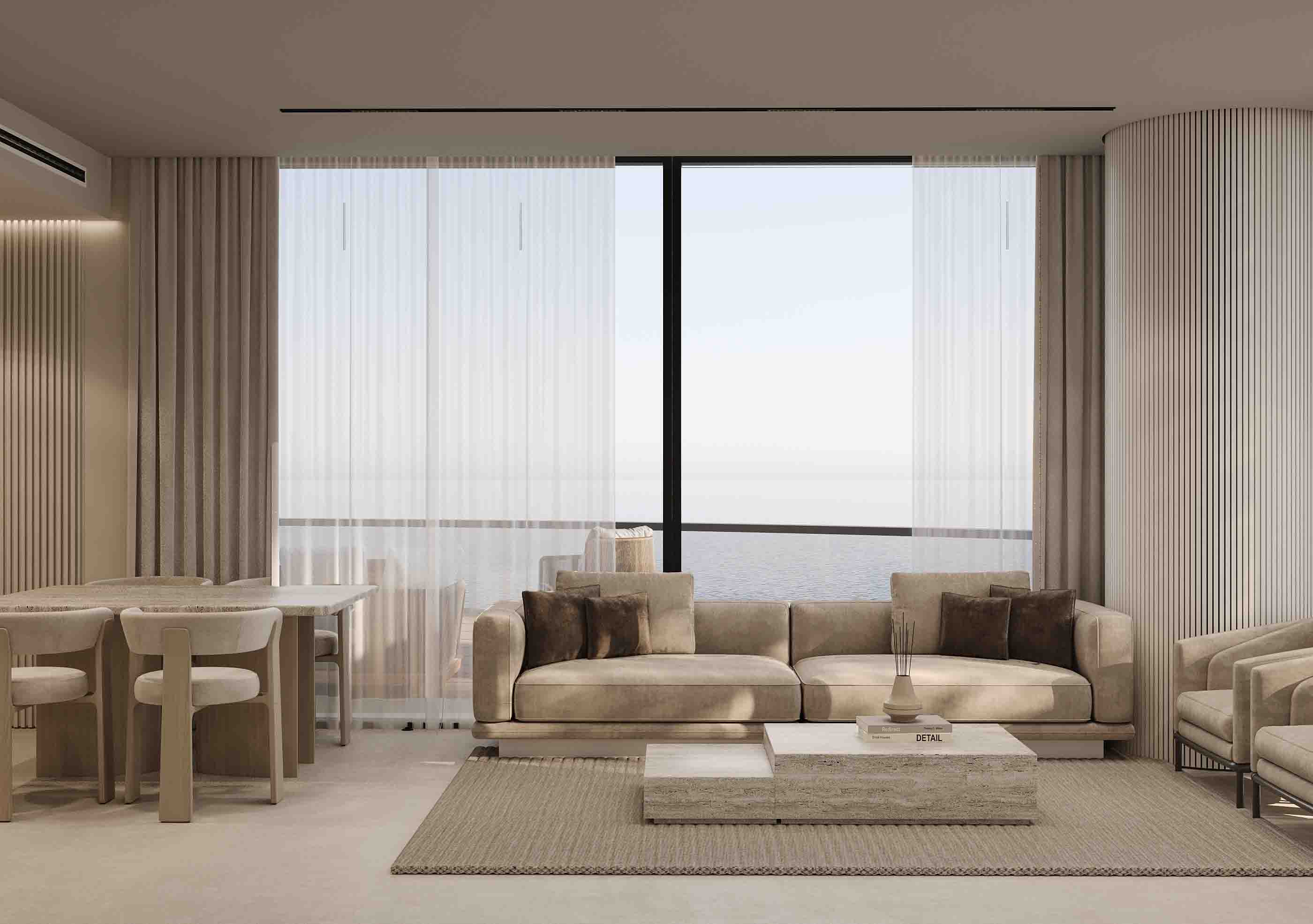Sophisticated living and dining room with neutral tones, panoramic sea view and floor-to-ceiling windows.