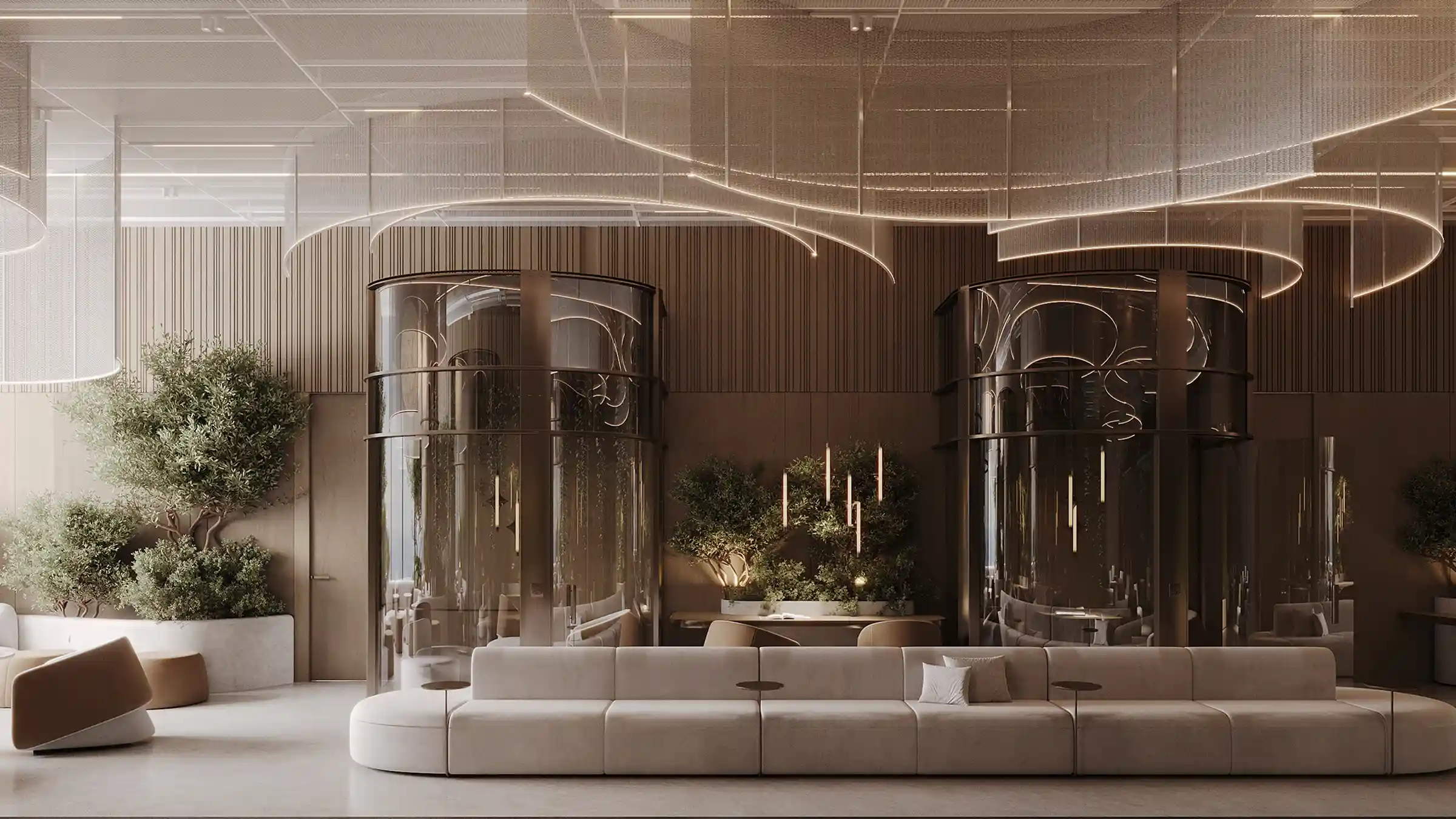 A serene workspace featuring curved glass meeting rooms, soft seating, and indoor greenery.